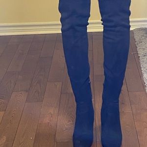 Black thigh high boots | also